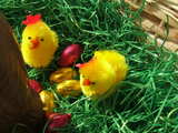 Easter chicks and Easter eggs, behind big Easter hare