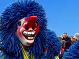 Carnival of Basel 2009, Waggis with blue hair, red nose, red tongue, big teeth