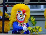 Carnival of Basel 2011, Waggis with Mimosa flowers.
