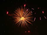 Firework on the Rhine 2005, orange star, eve of 1st August, Basle, Switzerland