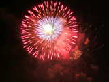 Firework on the Rhine 2005, big red flower with white center (the swiss flag ?), eve of 1st August, Basle, Switzerland