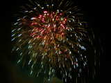 Firework on the Rhine 2006, pink and bluish needles followed by rusty rain, eve of 1st August, Basle, Switzerland