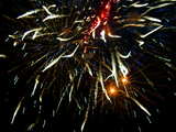 Firework on Mount Bruderholz 2006, wild and multicolored with small orange suns, 1st of August, Basle, Switzerland