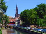 Little France, the river Ill in the quarter Petite France and the cathedral of Strasbourg