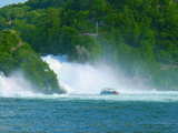 The Rhine falls, Schaffhouse, Switzerland, the central rock, a boat and a view-point terrace above the waterfalls