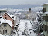 Heavy snowfall in March, next morning after 24 hours of snowing, people dig out their cars and build hills of snow