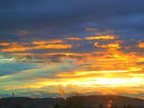 Sunrise with many orange clouds near the Chrischona, Radio and TV transmitting tower of Basle, Switzerland