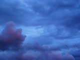 Slightly pink colored heavy clouds, July 2003
