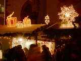 Xmas street illumination, a stand of the Christmas Market at the square of the barefoot, Barfuesserplatz in Basel, Switzerland, December 2005